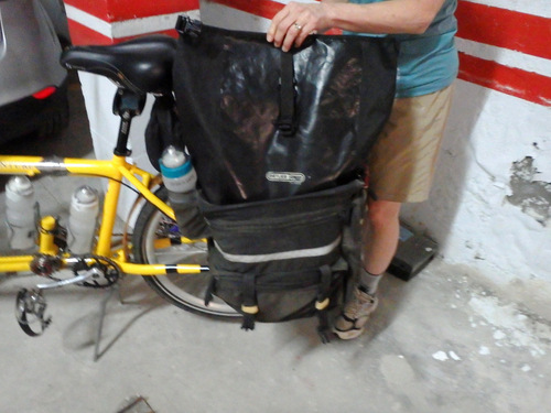 We are carrying our Nikon Digital 35mm SLR inside a waterproof pannier (Ortleib Brand) inside our own JANDD pannier.